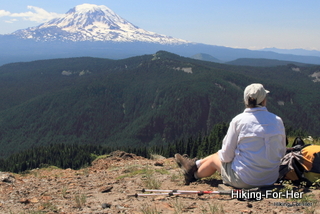 Female hiker enjoying a view of Mt. Adams in Washington State, USA