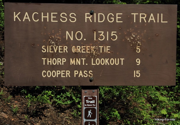 hiking trail signs at trailhead with names of trails and mileage hiking trail signs at trailhead with names of trails and mileage
