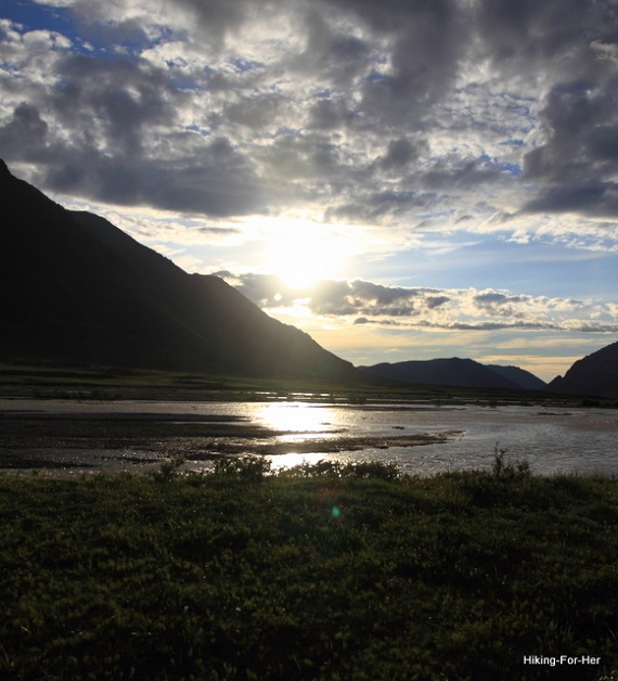 Midnight sun reflecting on Canning River in ANWR Alaska Midnight sun reflecting on Canning River in ANWR Alaska