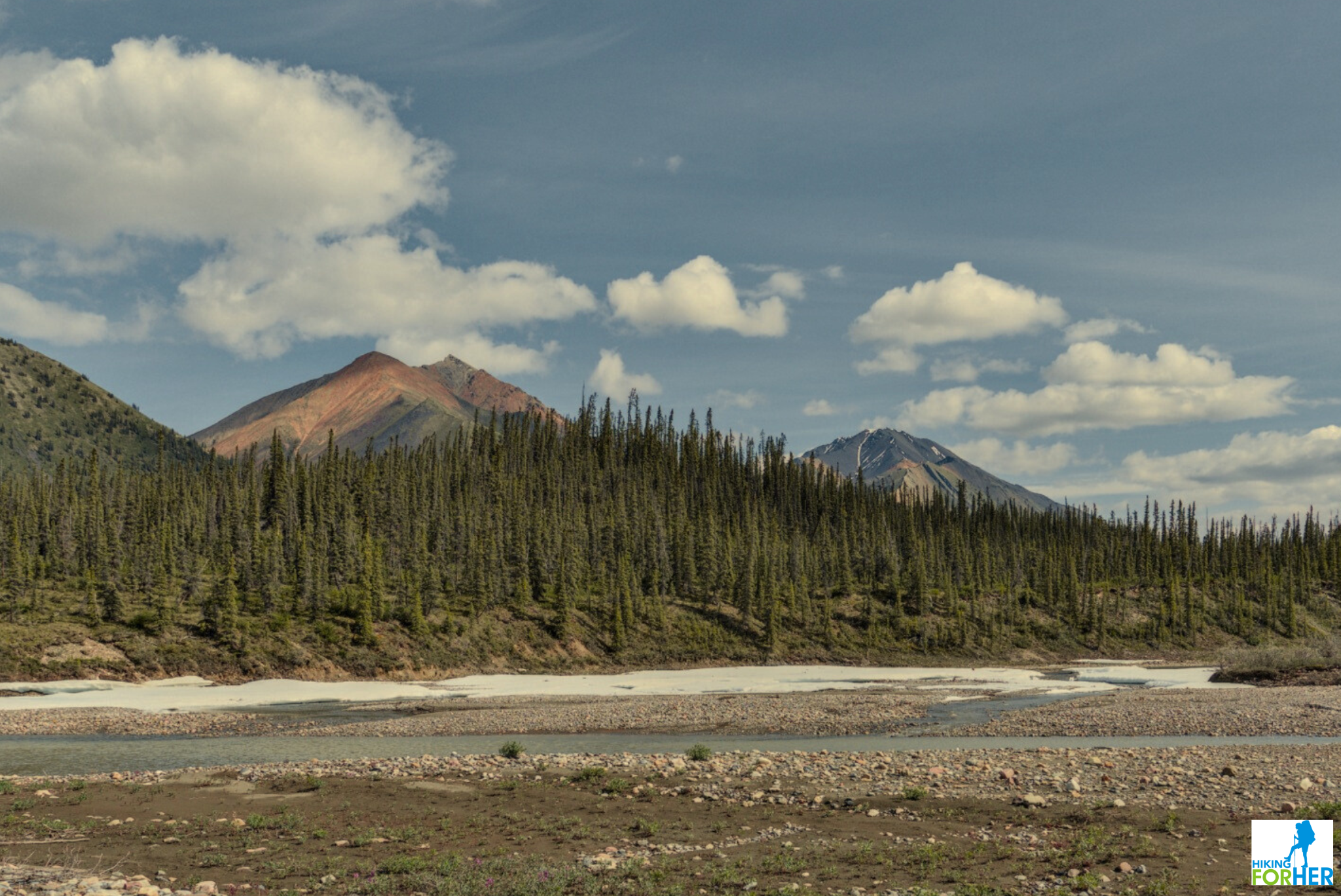 Aufeis along the bank of the Silverberry River in NW Territories in July