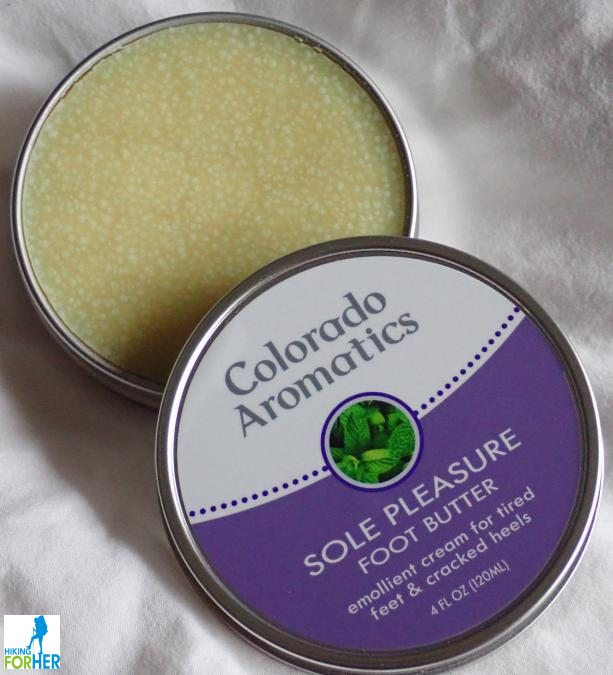 Colorado Aromatics foot butter tin with lid half open Colorado Aromatics foot butter tin with lid half open