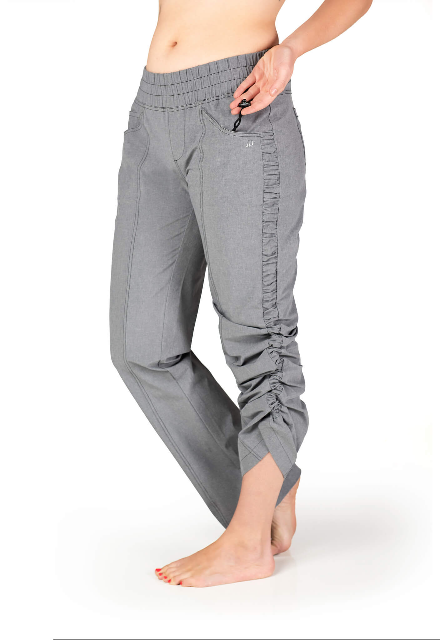Female hiker wearing gray SkirtSports pants Female hiker wearing gray SkirtSports pants