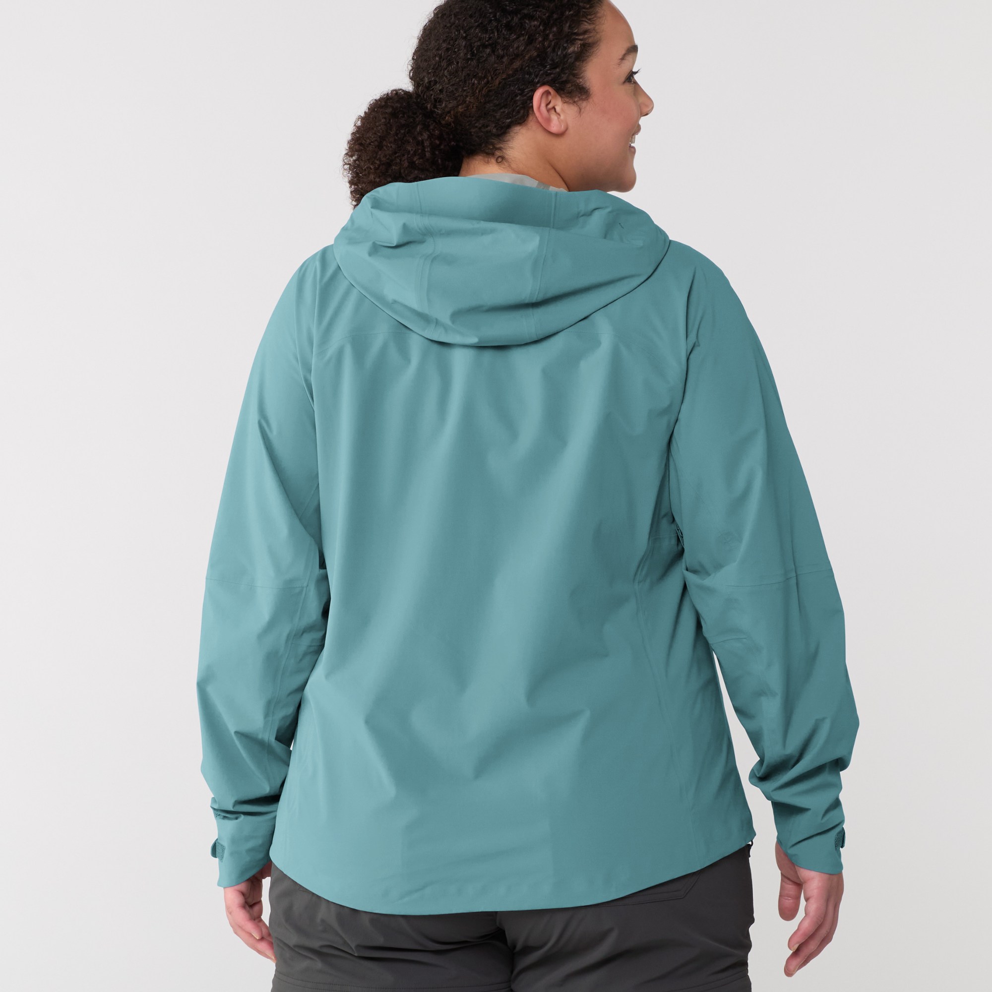 Back view of blue REI Xerocloud women's rain jacket